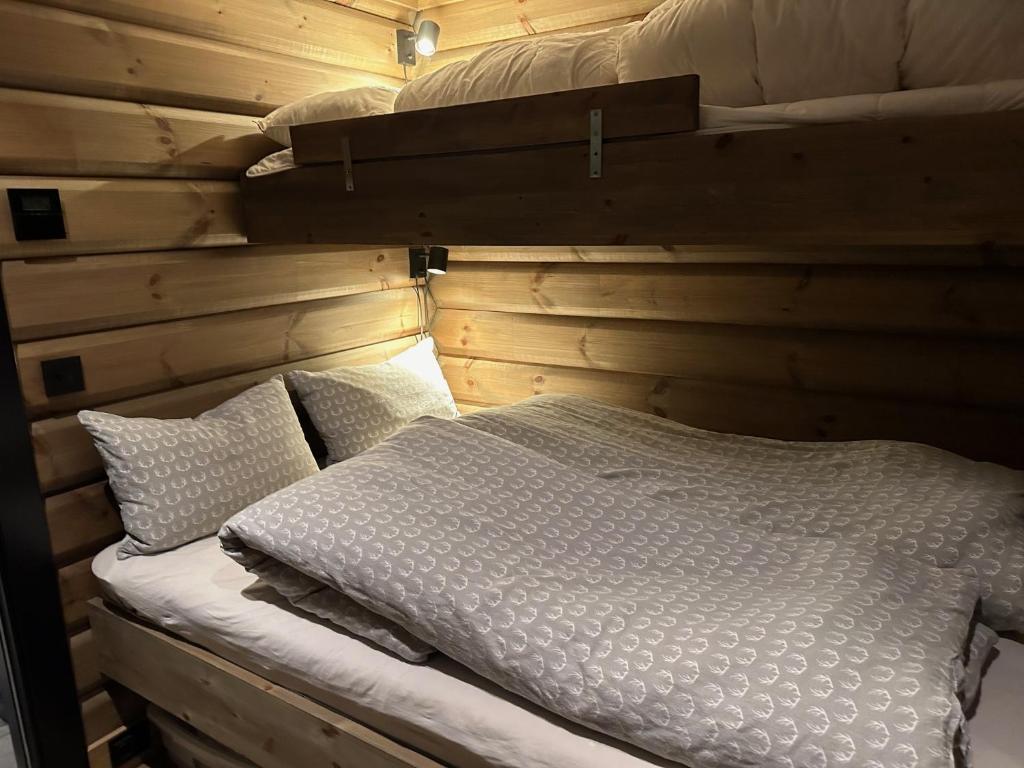 Postel nebo postele na pokoji v ubytování Årebjørnen - Sadelen