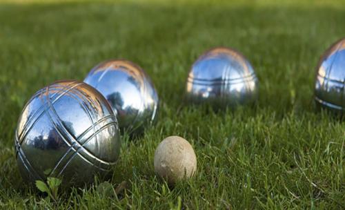 three balls in the grass next to a golf ball at house1 in Saly Portudal