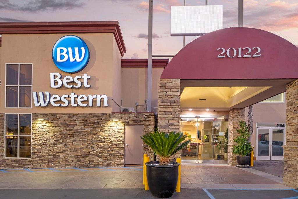 a building with a sign that reads buy best western at Best Western Canoga Park Motor Inn in Canoga Park
