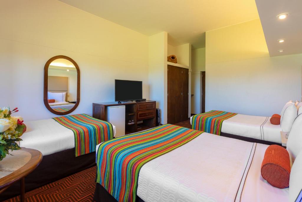 Cama ou camas em um quarto em Sonesta Posadas del Inca Puno