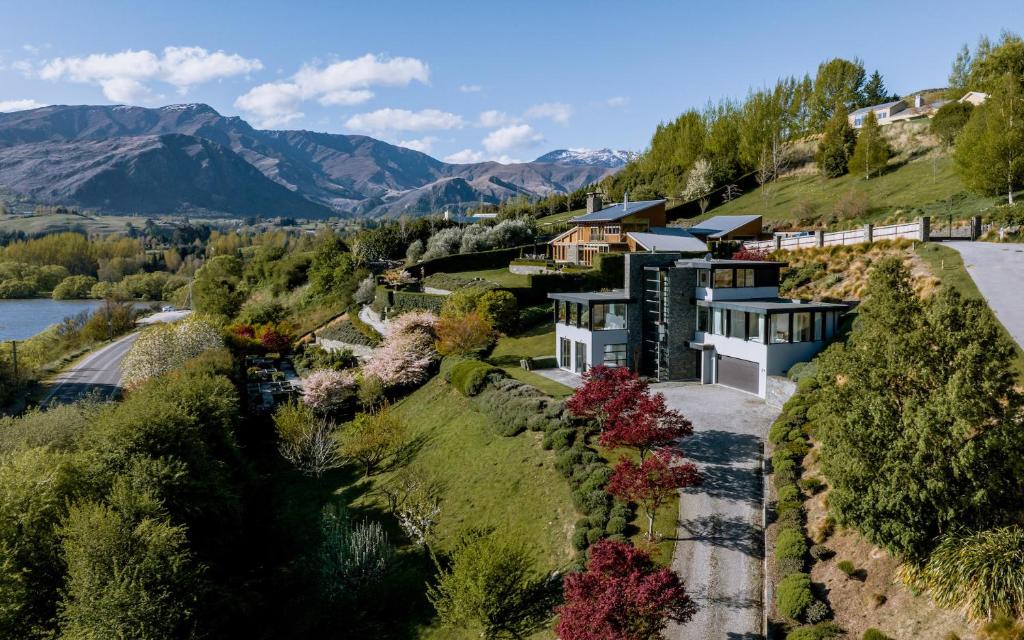 an aerial view of a house on a hill at Hawthorne House in Queenstown