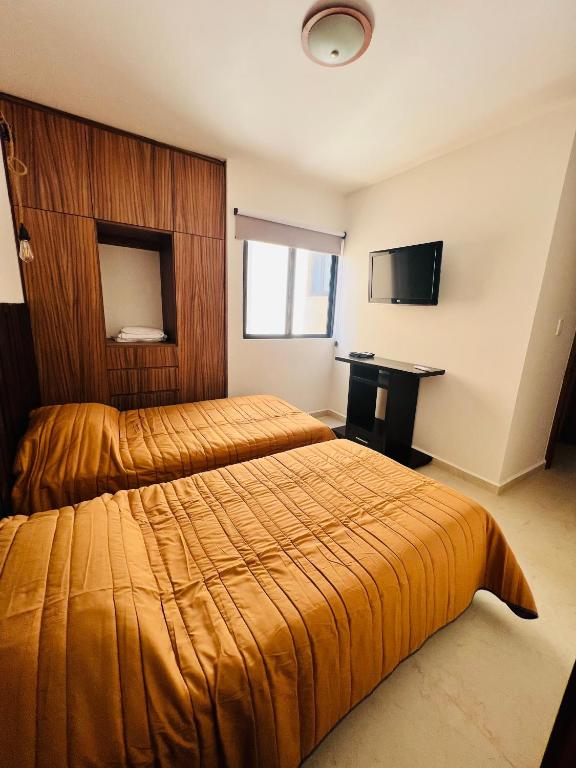 Postel nebo postele na pokoji v ubytování Torre Riviera el mar