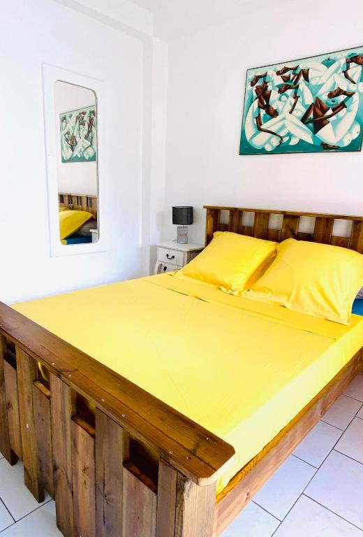 Postel nebo postele na pokoji v ubytování Auberge K-WAN Hostel - Proche Plages
