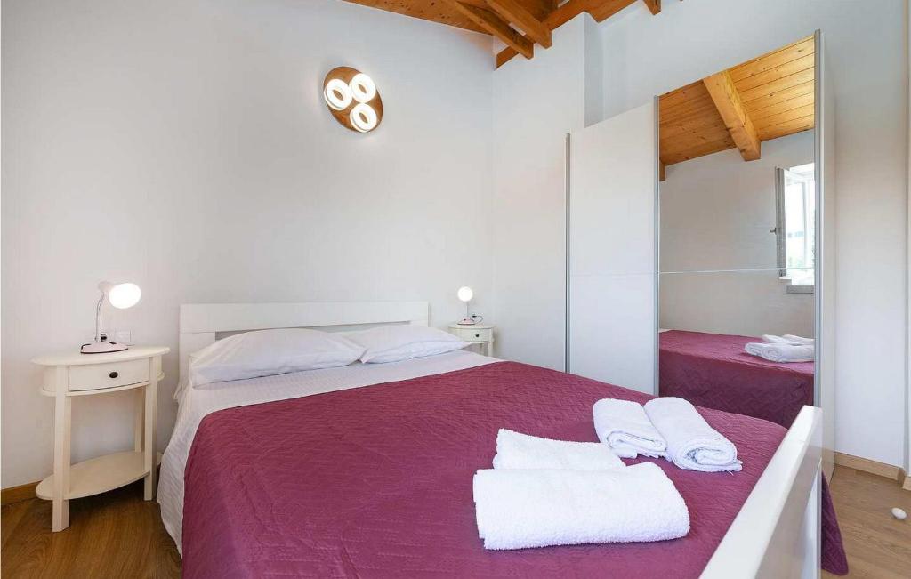Postel nebo postele na pokoji v ubytování Villa Irena Funtana