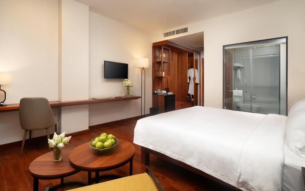 TV a/nebo společenská místnost v ubytování Koulen Central Hotel