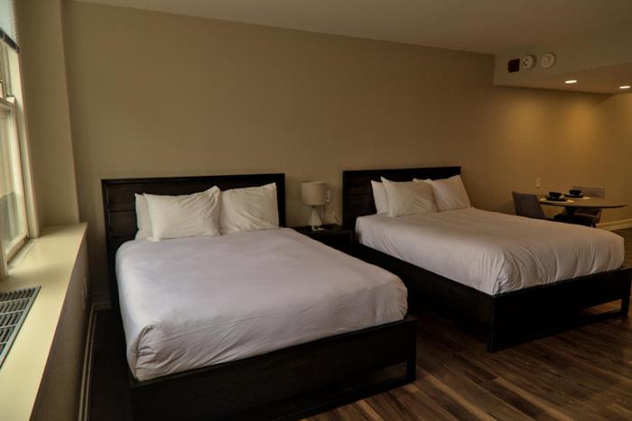 Postel nebo postele na pokoji v ubytování Hotel Leo