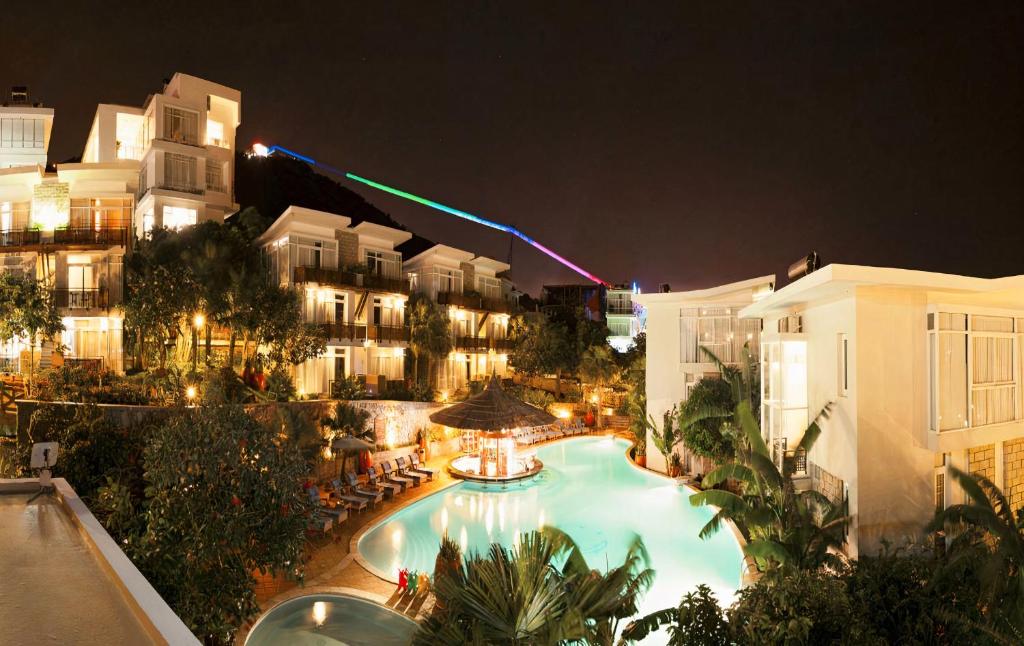 an overhead view of a swimming pool at night at Seaside Resort Vung Tau in Vung Tau