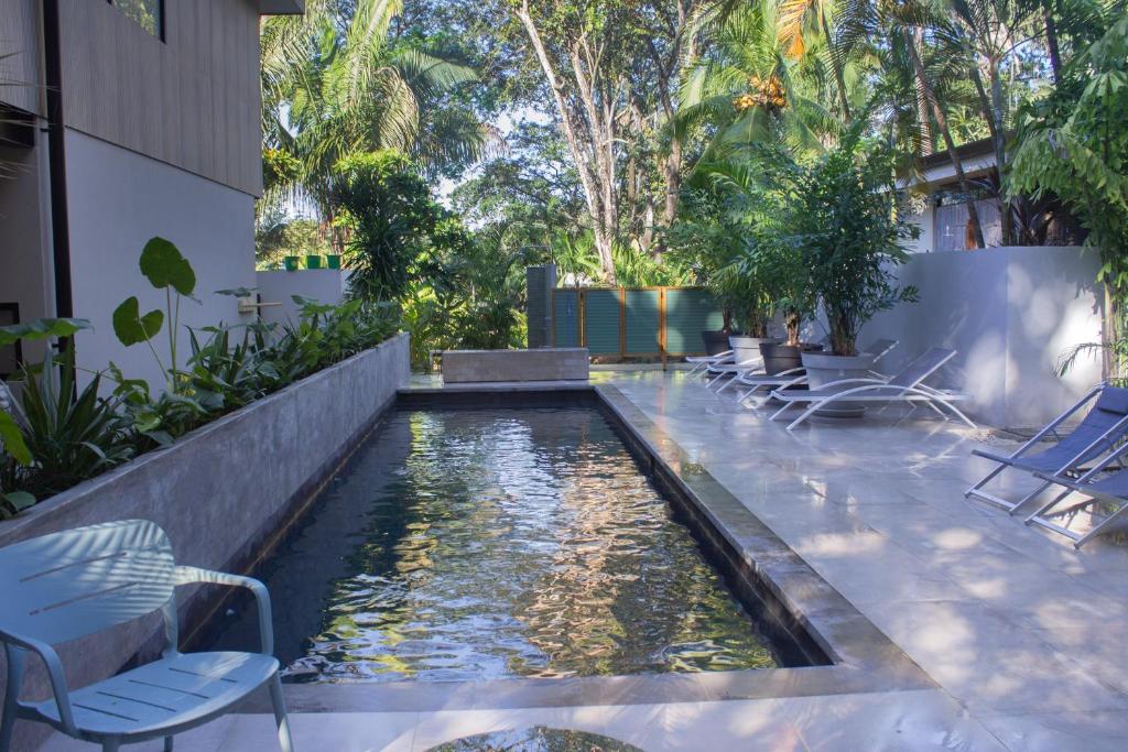 Bazén v ubytování D'Palm Villas nebo v jeho okolí