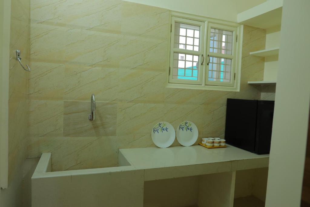 Koupelna v ubytování Padma Homes Stay- Luxury Service Apartment 1BHK & 2BHK & 3BHK