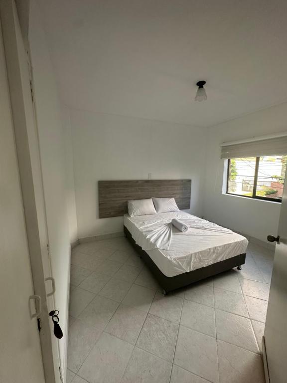 Кровать или кровати в номере Casa Estadio laureles