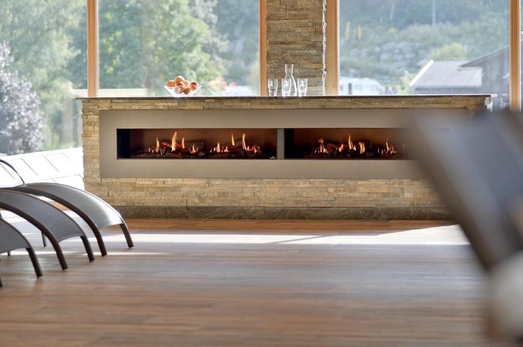 Posedenie v ubytovaní Chalet - Direkt am 5 Sterne Campingplatz Aufenfeld im Zillertal mit Hallenbad und Sauna