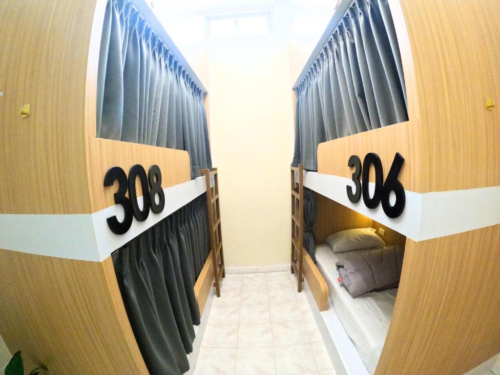 Postel nebo postele na pokoji v ubytování KPOP Hostel