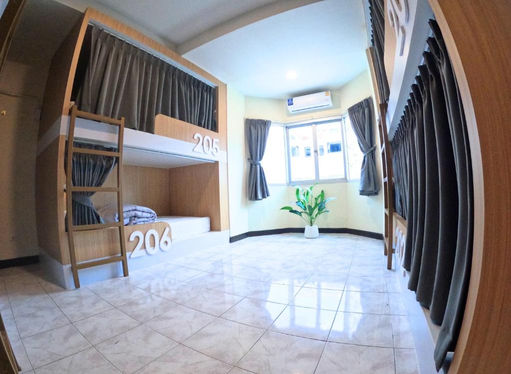 Postel nebo postele na pokoji v ubytování KPOP Hostel