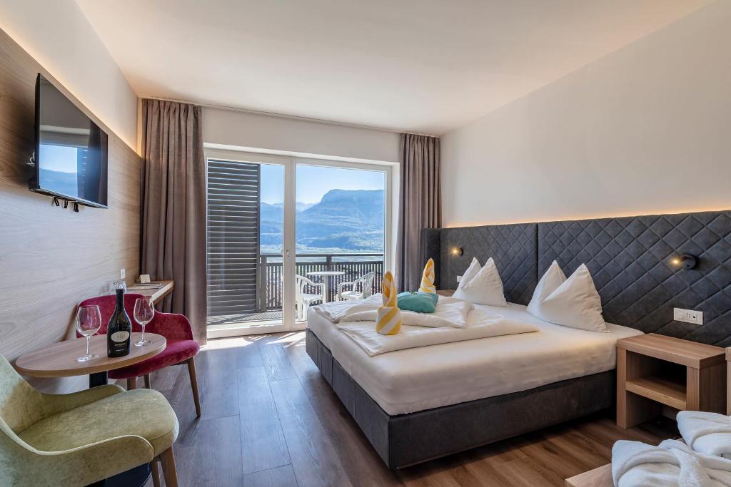 Postel nebo postele na pokoji v ubytování Hotel Winzerhof