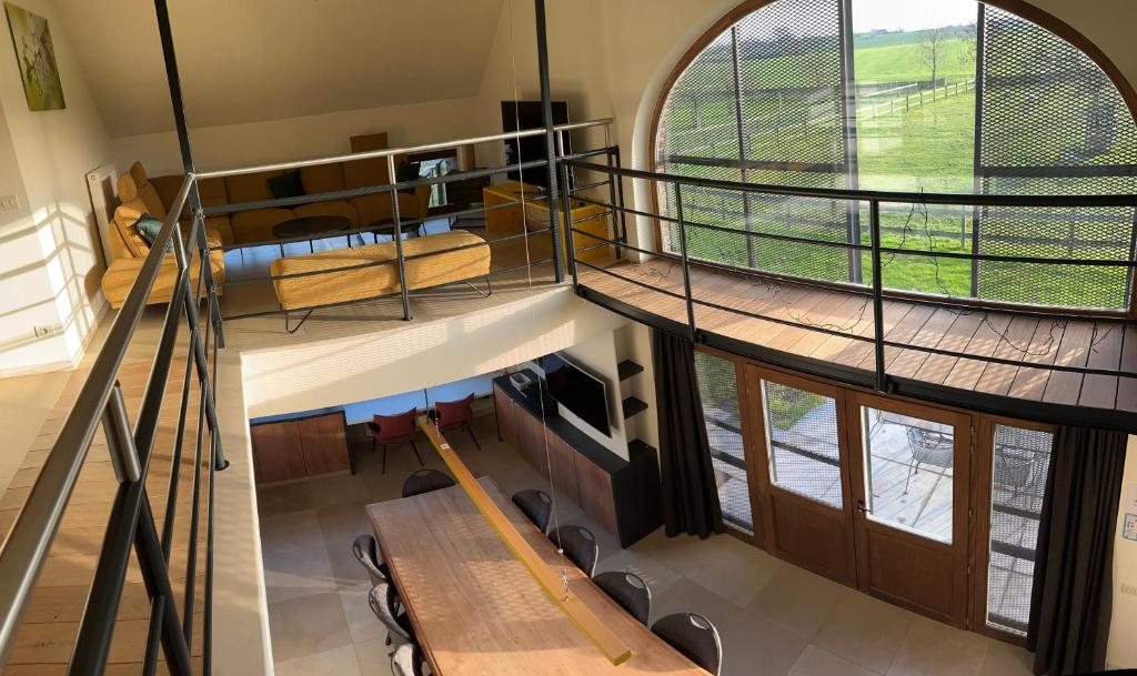 an overhead view of a building with a spiral staircase at B&amp;B - Ter Douve in Dranouter