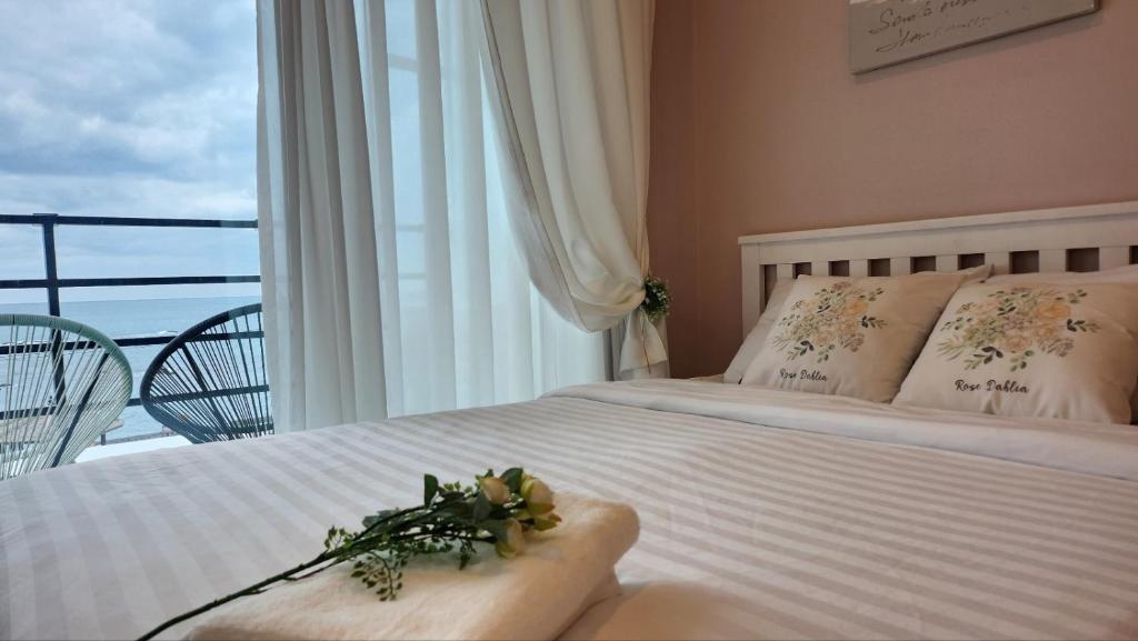 Postel nebo postele na pokoji v ubytování Pension Haneul Tari