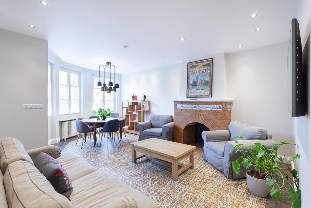 Posezení v ubytování Les appartements de Chantilly - gare