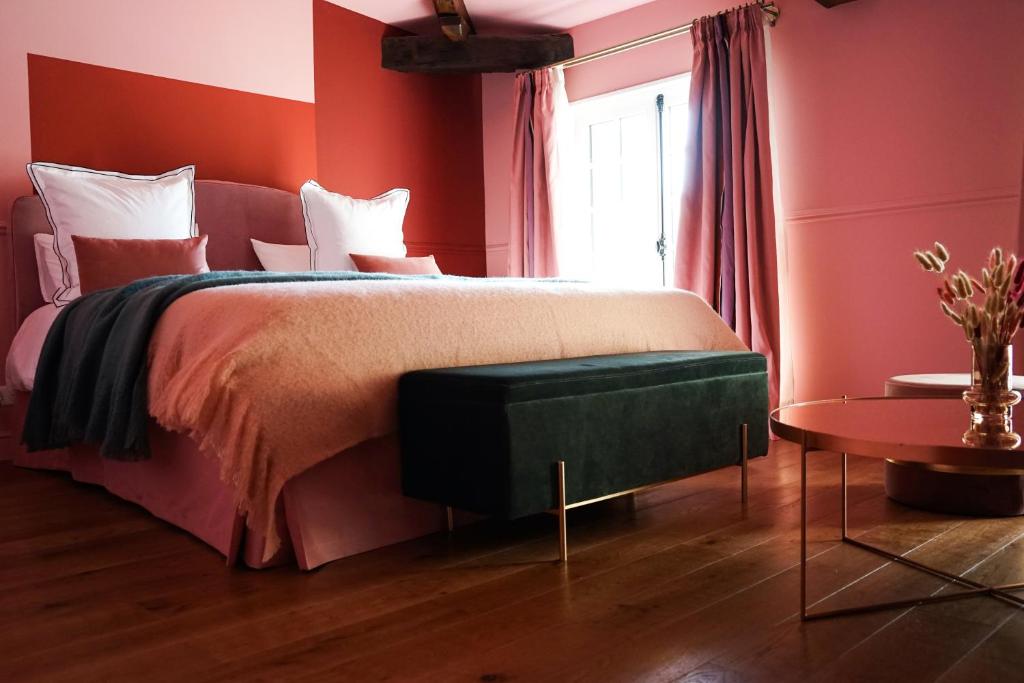 Кровать или кровати в номере Château Haut-Brisson