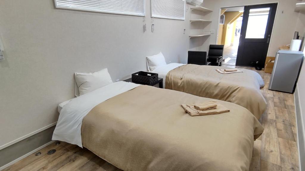 Postel nebo postele na pokoji v ubytování Basic Hotel Chichibu
