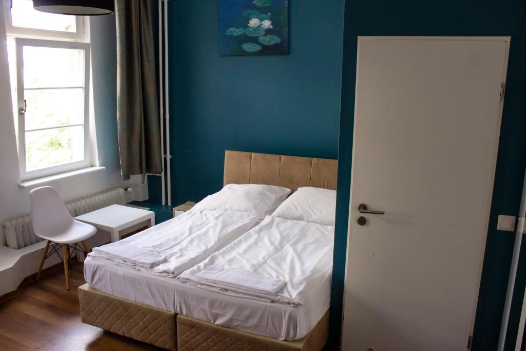 Postel nebo postele na pokoji v ubytování Metropol Hostel Berlin