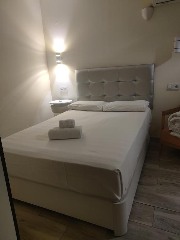 Postel nebo postele na pokoji v ubytování Good Stay Rooms
