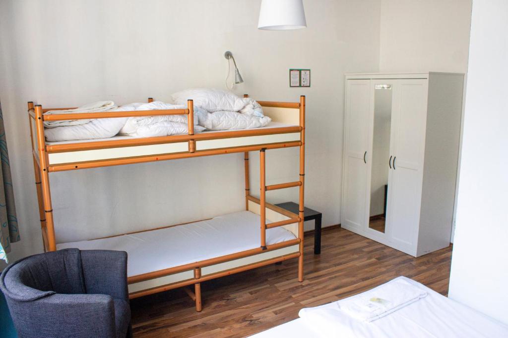 Postel nebo postele na pokoji v ubytování Metropol Hostel Berlin