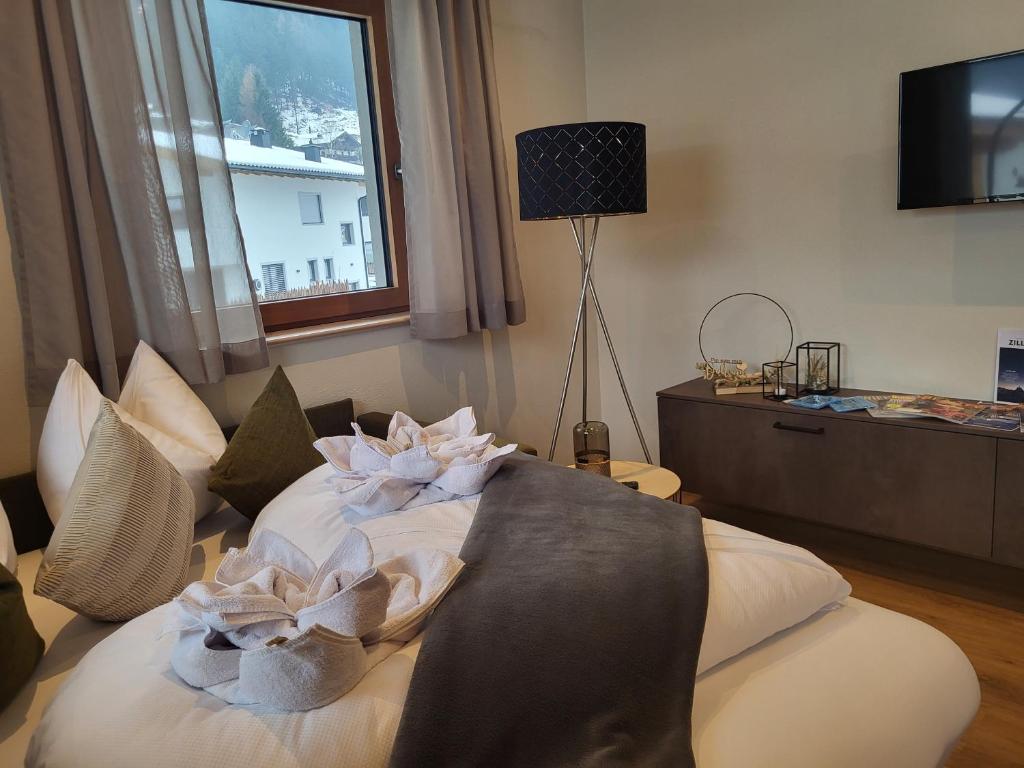 TV a/nebo společenská místnost v ubytování Apart Isabella