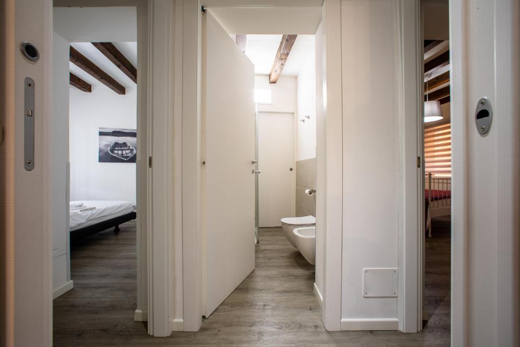 A bed or beds in a room at San Faustino Central Apartment