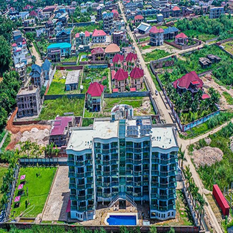 an aerial view of a building in a city at Paradise Appartment hotel in Mutumba