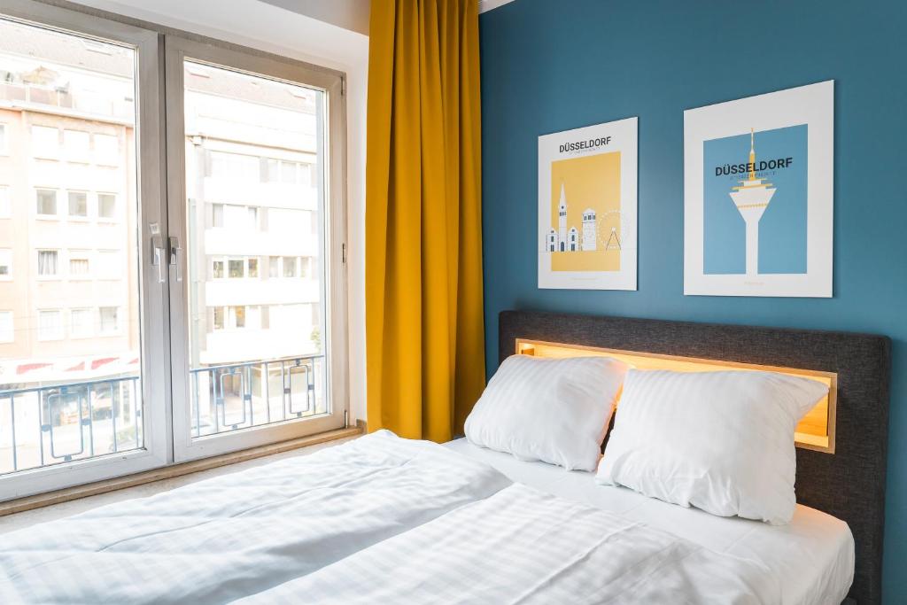 Antares Apartmentsにあるベッド