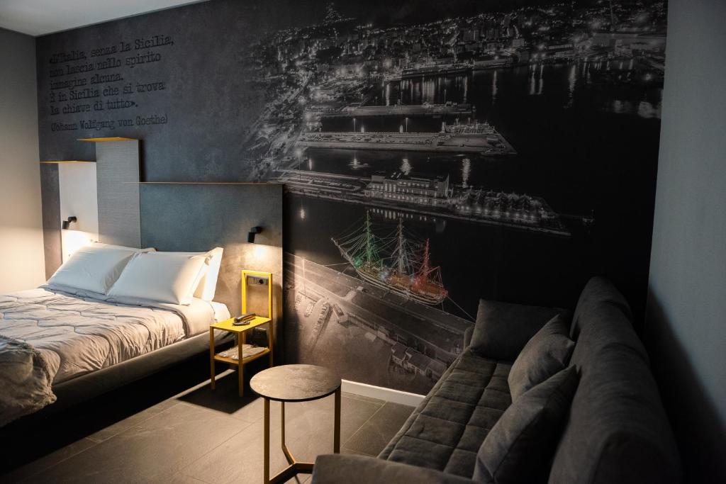 Postel nebo postele na pokoji v ubytování Alma Hotel