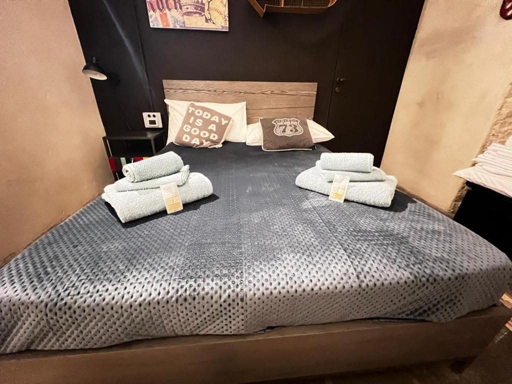 Postel nebo postele na pokoji v ubytování Urban Suite
