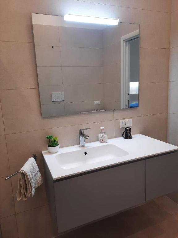 Koupelna v ubytování Azzurro Mare Aparthotel