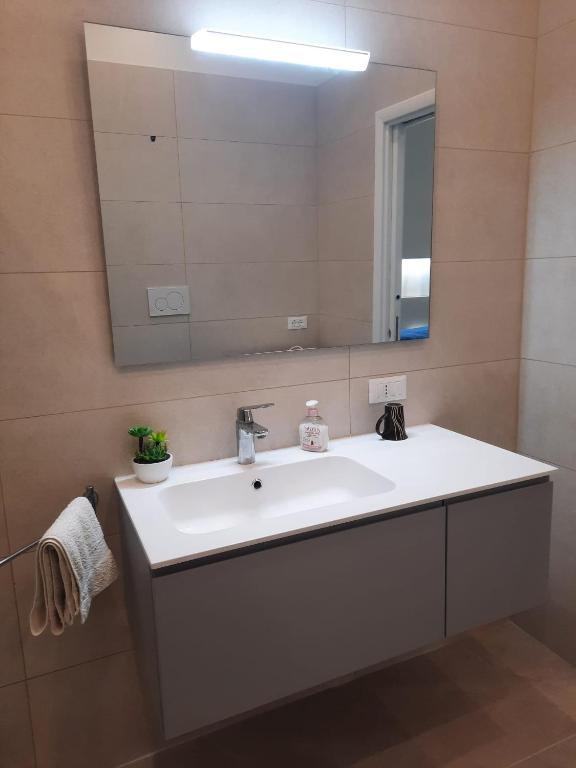 Koupelna v ubytování Azzurro Mare Aparthotel