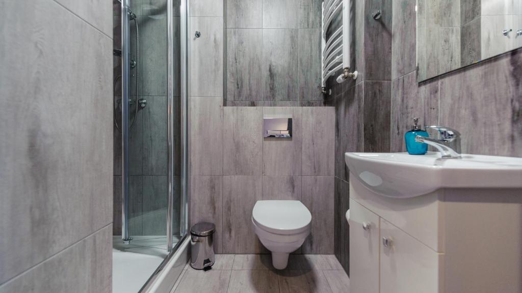 Koupelna v ubytování Apartamenty Sun & Snow Sanatoryjna - blisko plaży