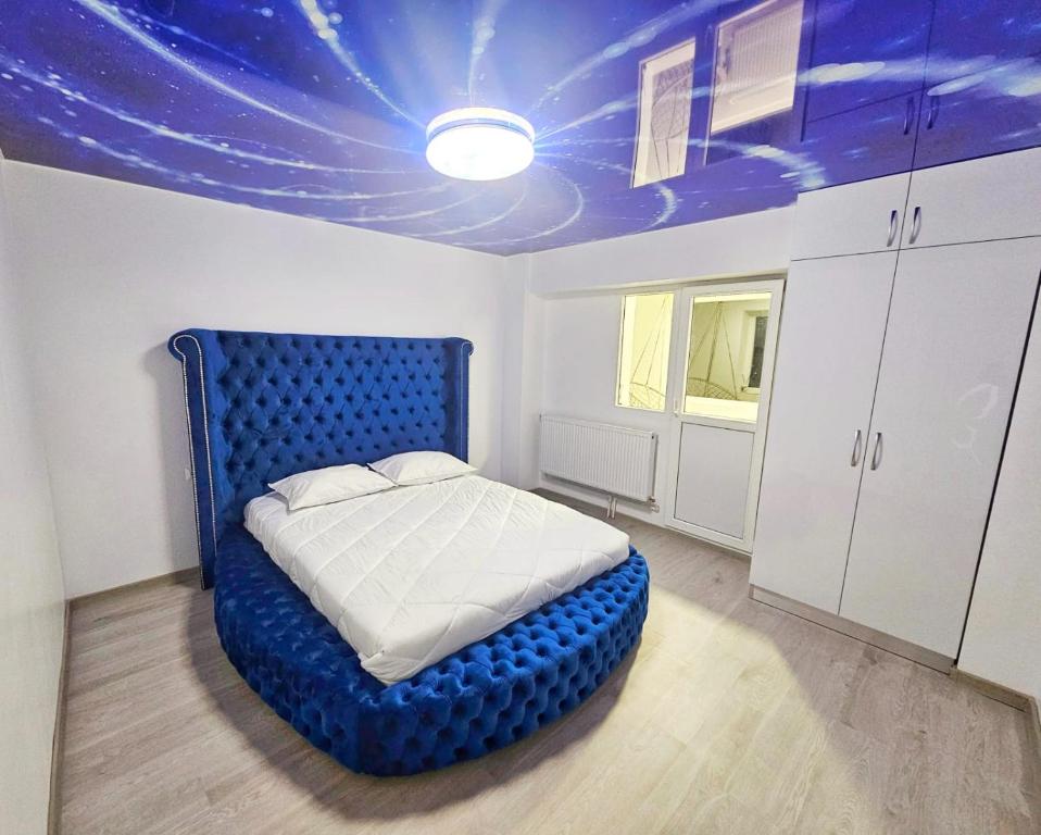 เตียงในห้องที่ Blue Apartament Braila