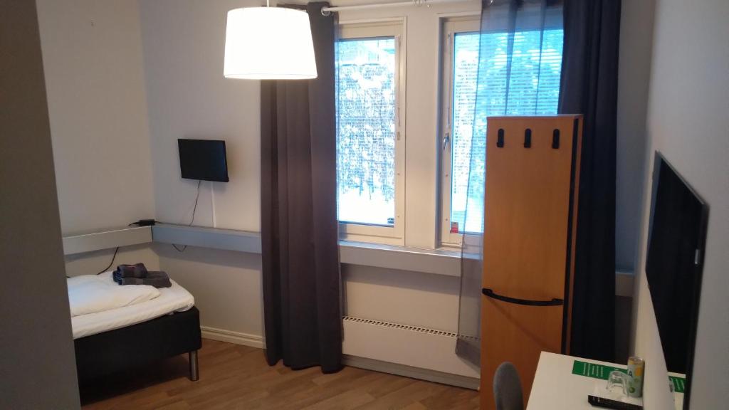 TV a/nebo společenská místnost v ubytování Hotel Charlotte / Stella