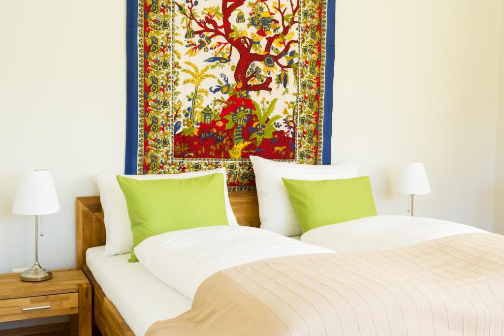 Postel nebo postele na pokoji v ubytování Hermitage Vital Hotel