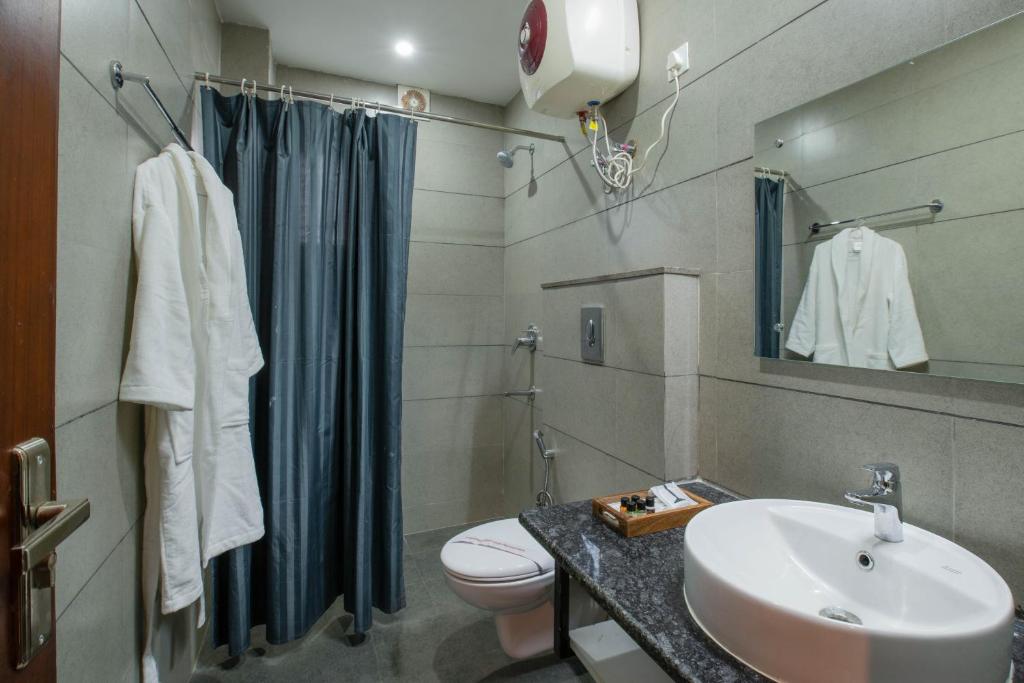 Koupelna v ubytování PerfectStayz Shimla