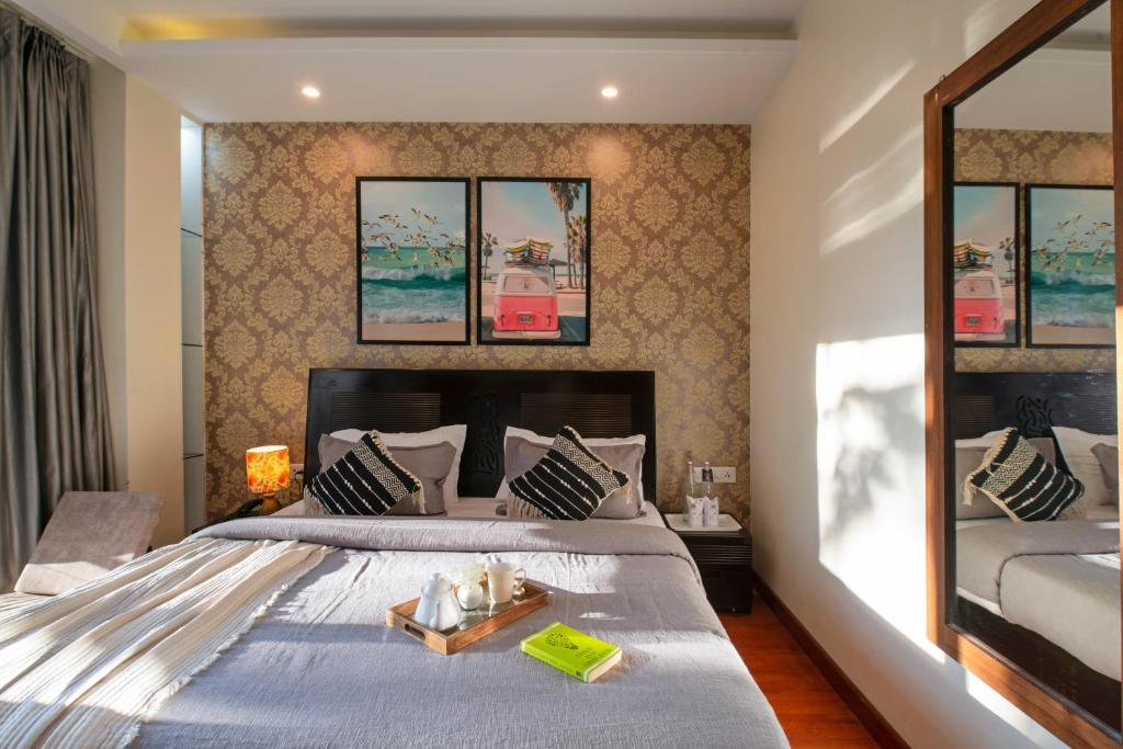 Postel nebo postele na pokoji v ubytování PerfectStayz Shimla