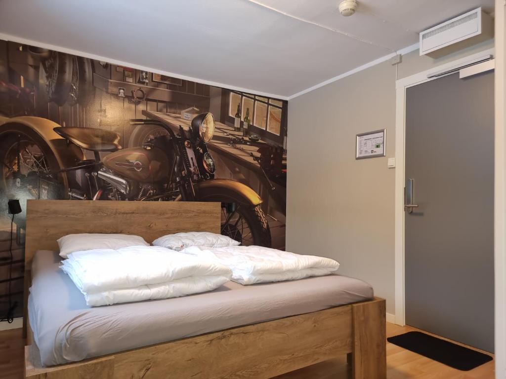 Postel nebo postele na pokoji v ubytování HI Oslo Haraldsheim
