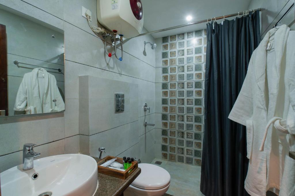Koupelna v ubytování PerfectStayz Shimla
