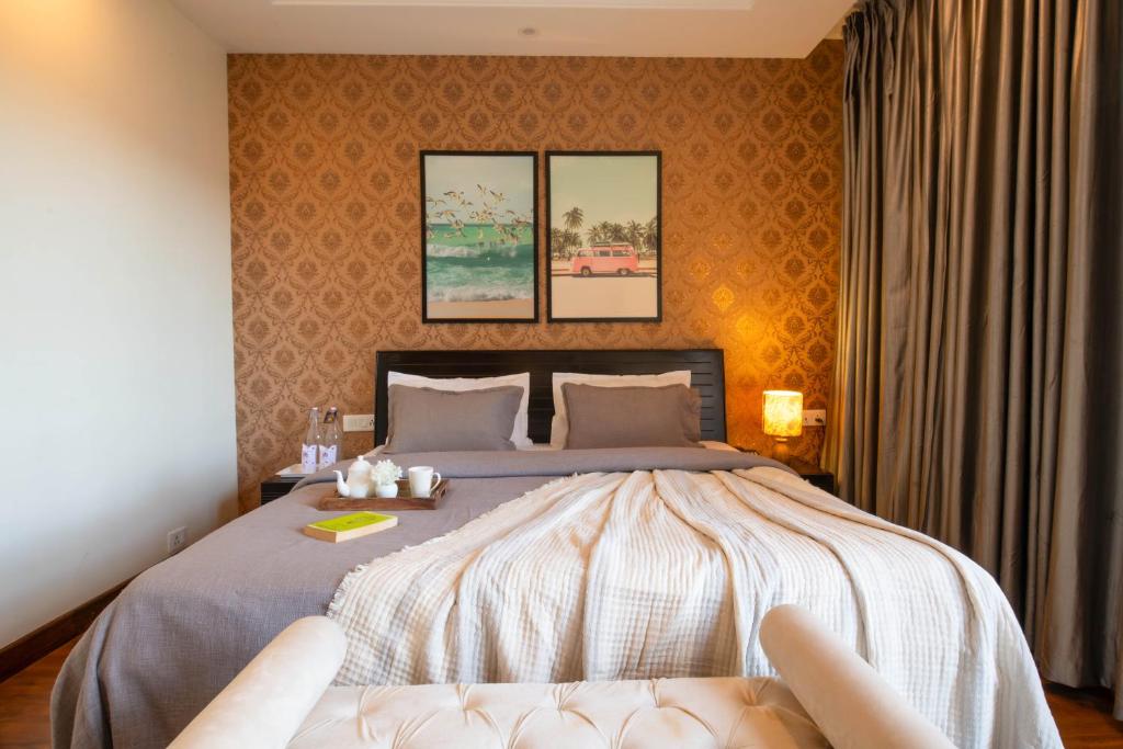 Postel nebo postele na pokoji v ubytování PerfectStayz Shimla