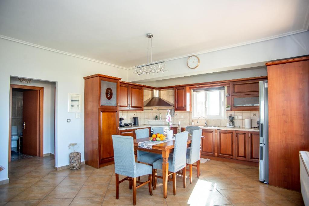 Kuchyň nebo kuchyňský kout v ubytování Irida's house