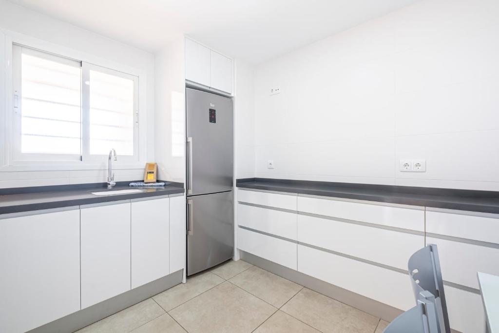 A kitchen or kitchenette at Alteanos 16-2 Apartment Levante Beach