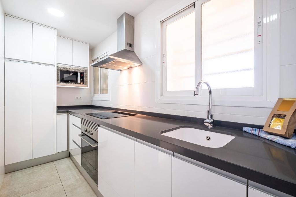 A kitchen or kitchenette at Alteanos 16-2 Apartment Levante Beach