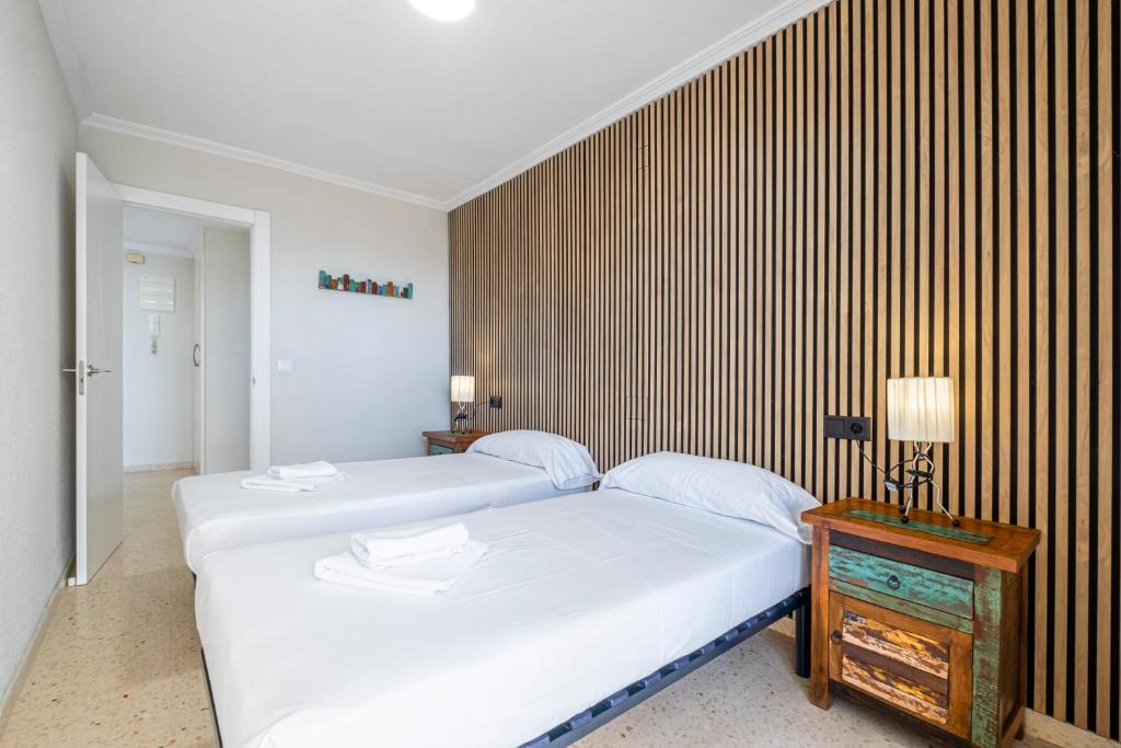 A bed or beds in a room at Alteanos 16-2 Apartment Levante Beach
