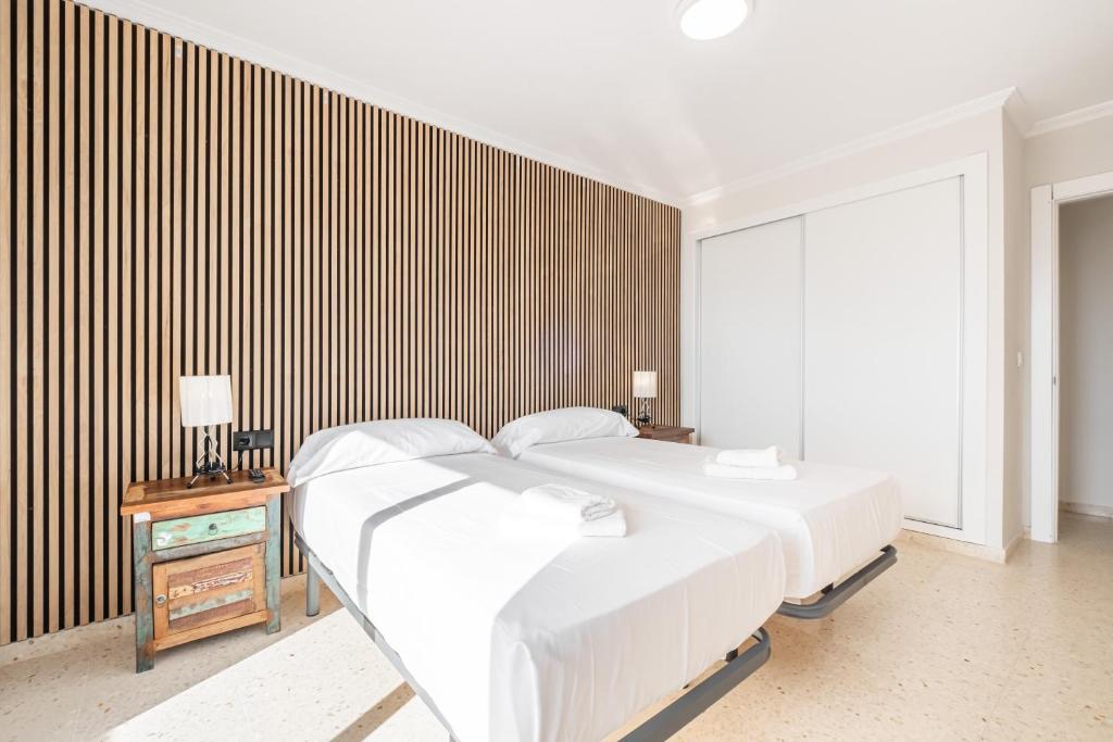 A bed or beds in a room at Alteanos 16-2 Apartment Levante Beach