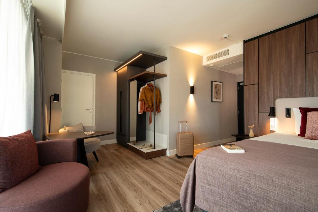 Postel nebo postele na pokoji v ubytování Bilderberg Europa Hotel Scheveningen
