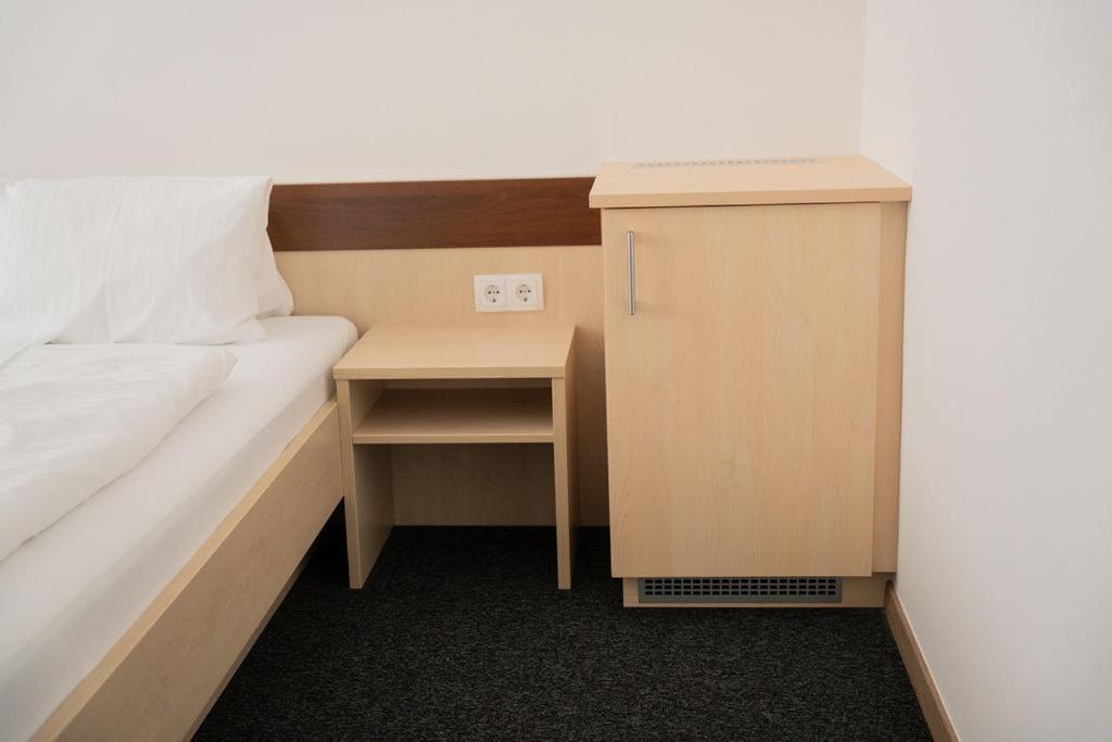 Postel nebo postele na pokoji v ubytování Frühstückspension Auer - Haus Kargl